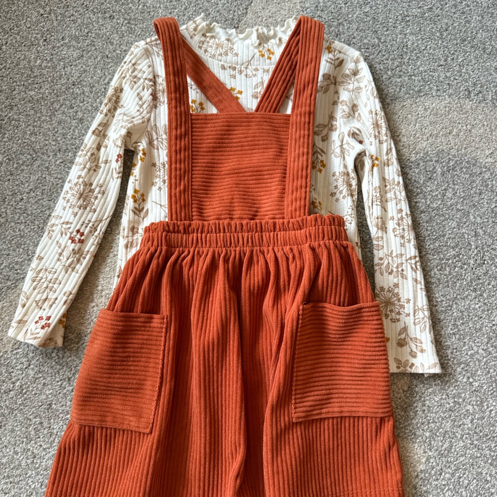 Rust Orange Ribbed Jumpsuit with Floral Accents